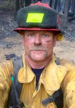 Brent Barlett in firefighter uniform
