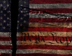 Ripped US flag "We the People"